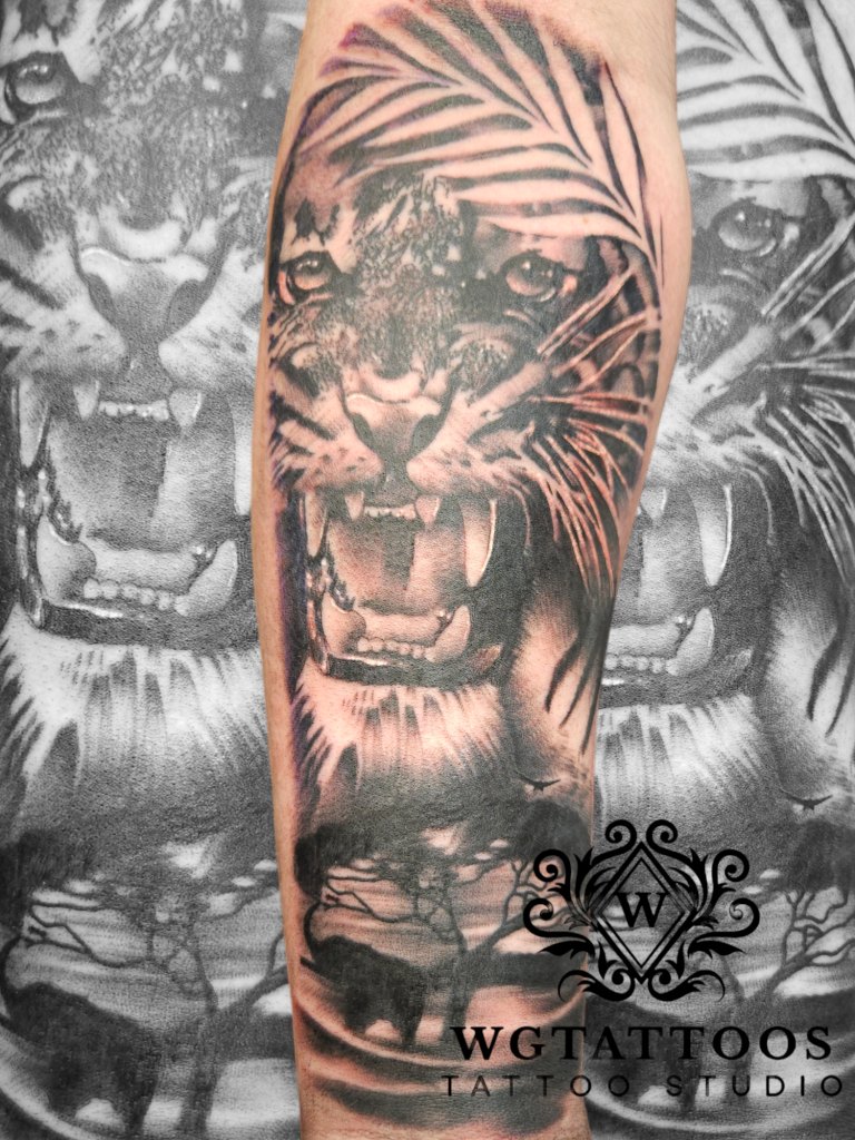 Black and grey tattoo by Wayne Goodwin