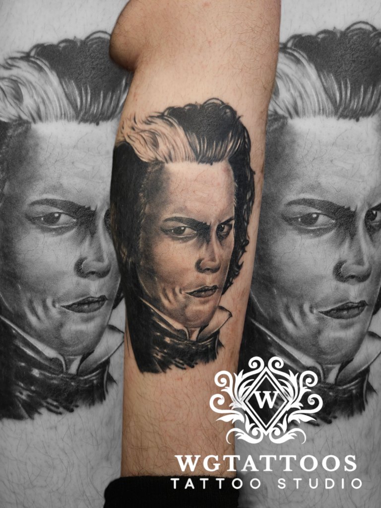 Black and grey tattoo by Wayne Goodwin