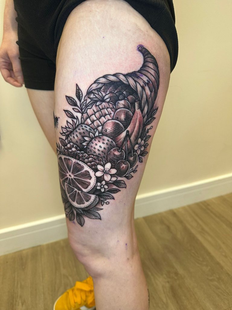 Black and grey tattoo by Wayne Goodwin