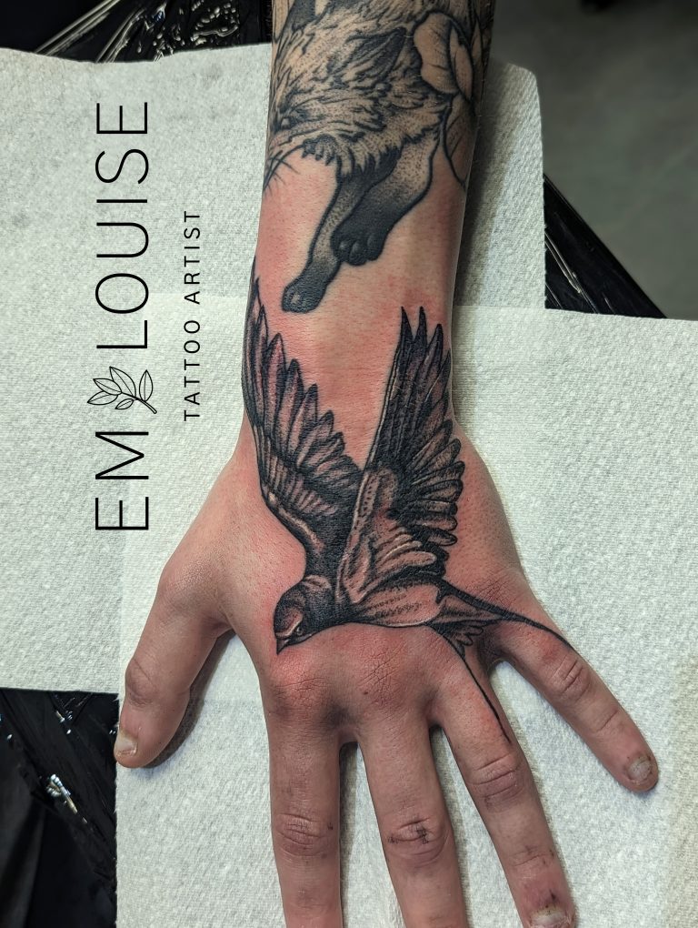 Black and grey tattoo by Em Louise