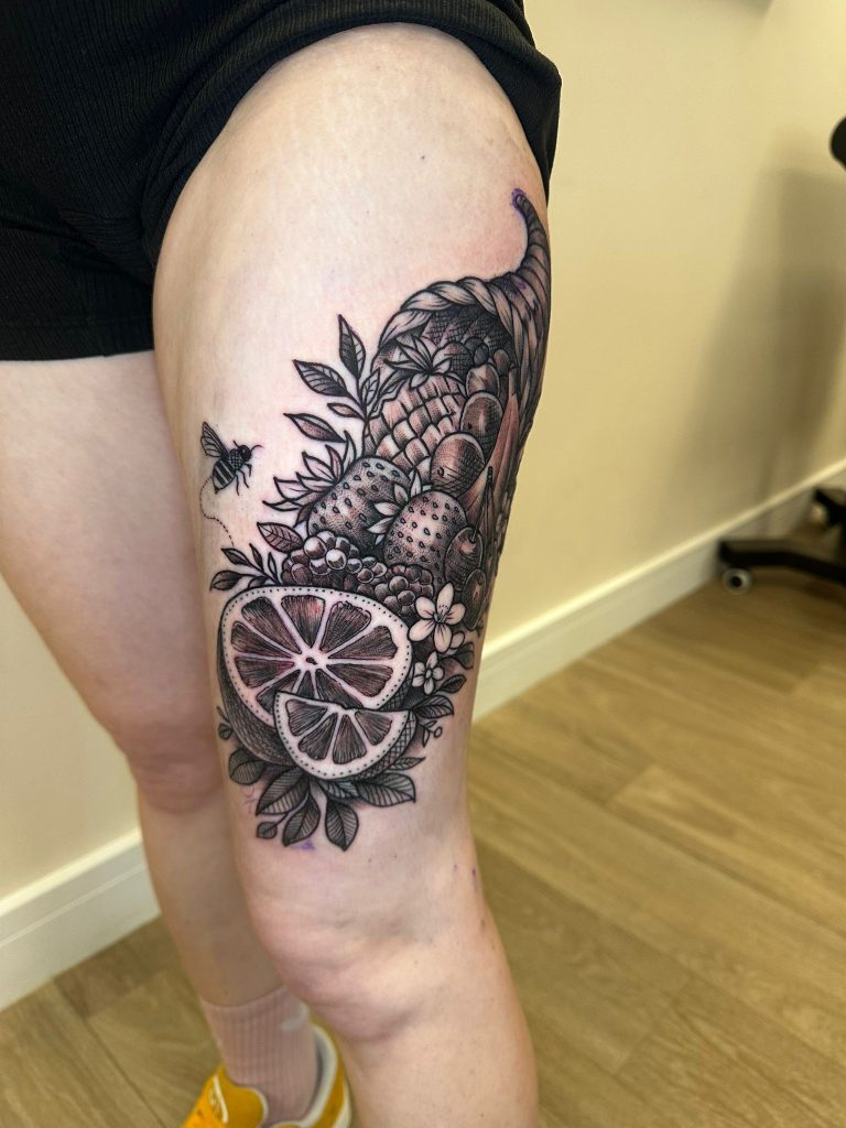 Black and grey tattoo by Wayne Goodwin