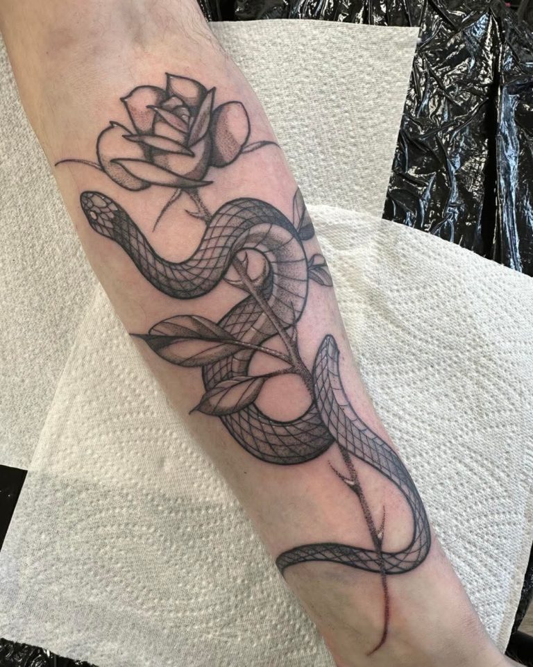 Black and grey tattoo by Em Louise